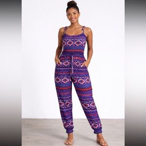 Rue21 Vibrant Purple and Red Patterned Jumpsuit